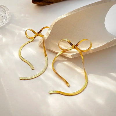 Jasmine Dangling Bow Earrings - Gold